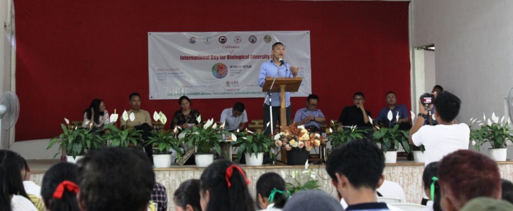 A speaker addressing the International Day for Biological Diversity 2024 at Jubilee Hall, St Xavier Parish, Jalukie on May 22.